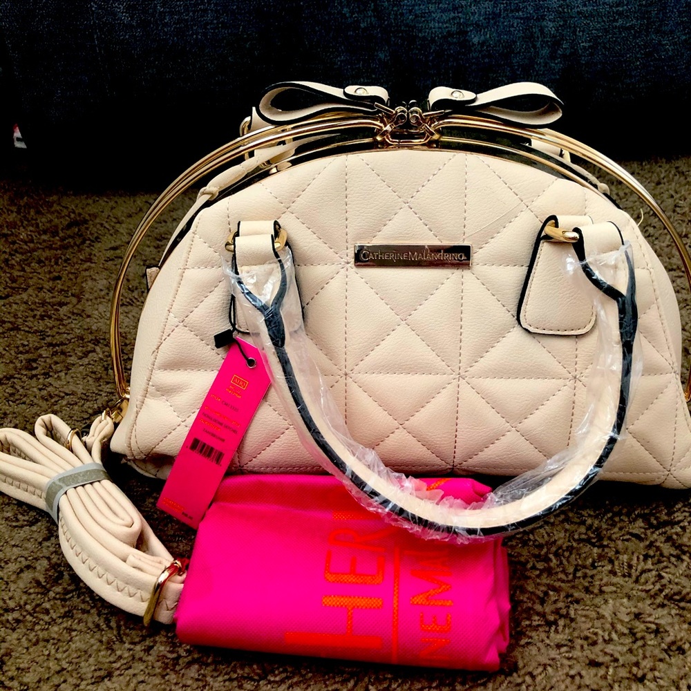 NWT.Catherine Malandrino:Fiona dome satchel with adjustable and removable strap.